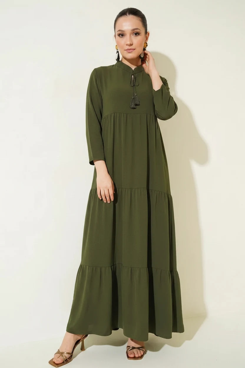 Kadın Bağcıklı Yaka Beli Büzgülü Fırfırlı Etek Ucu Katmanlı Tesettür Elbise